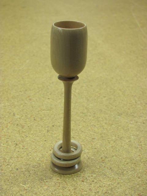 Captive rings on a goblet
